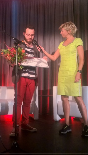 winnaar Dick Spruitenburg met moderator Isolde Hallensleben